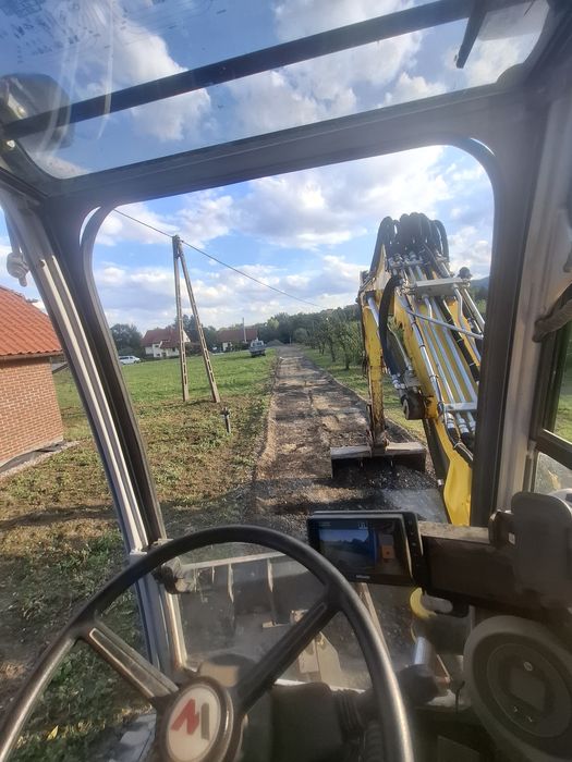 Usługi koparką kołową 11 ton, wyburzenia, prace ziemne, stawy, rowy,