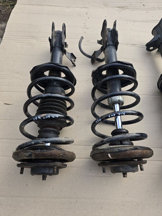 Стойки в сборе Nissan Sunny N14 91-96 левая правая передняя задняя