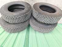 Opony AT  ALL-TERRAIN 215/80 R16 bieżnikowana, stan bardzo dobry