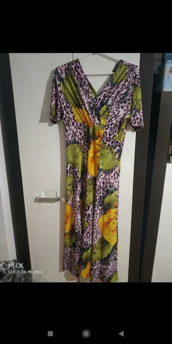 Przepiękna długa sukienka damska.