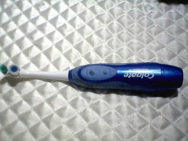 Электрическая зубная щетка Colgate Motion