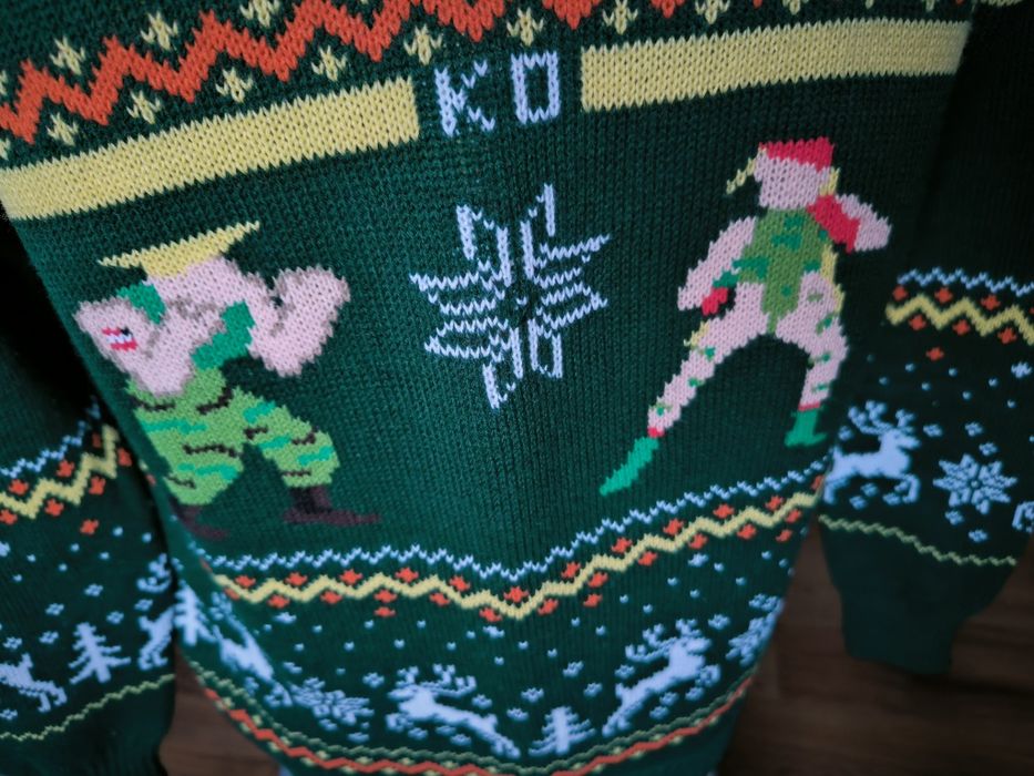 Numskull Street Fighter Christmas Sweater Royal zielony KO L RRP €40
