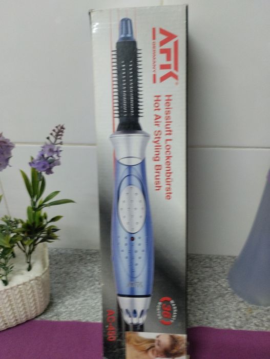 Escova modeladora e alisadores de cabelos