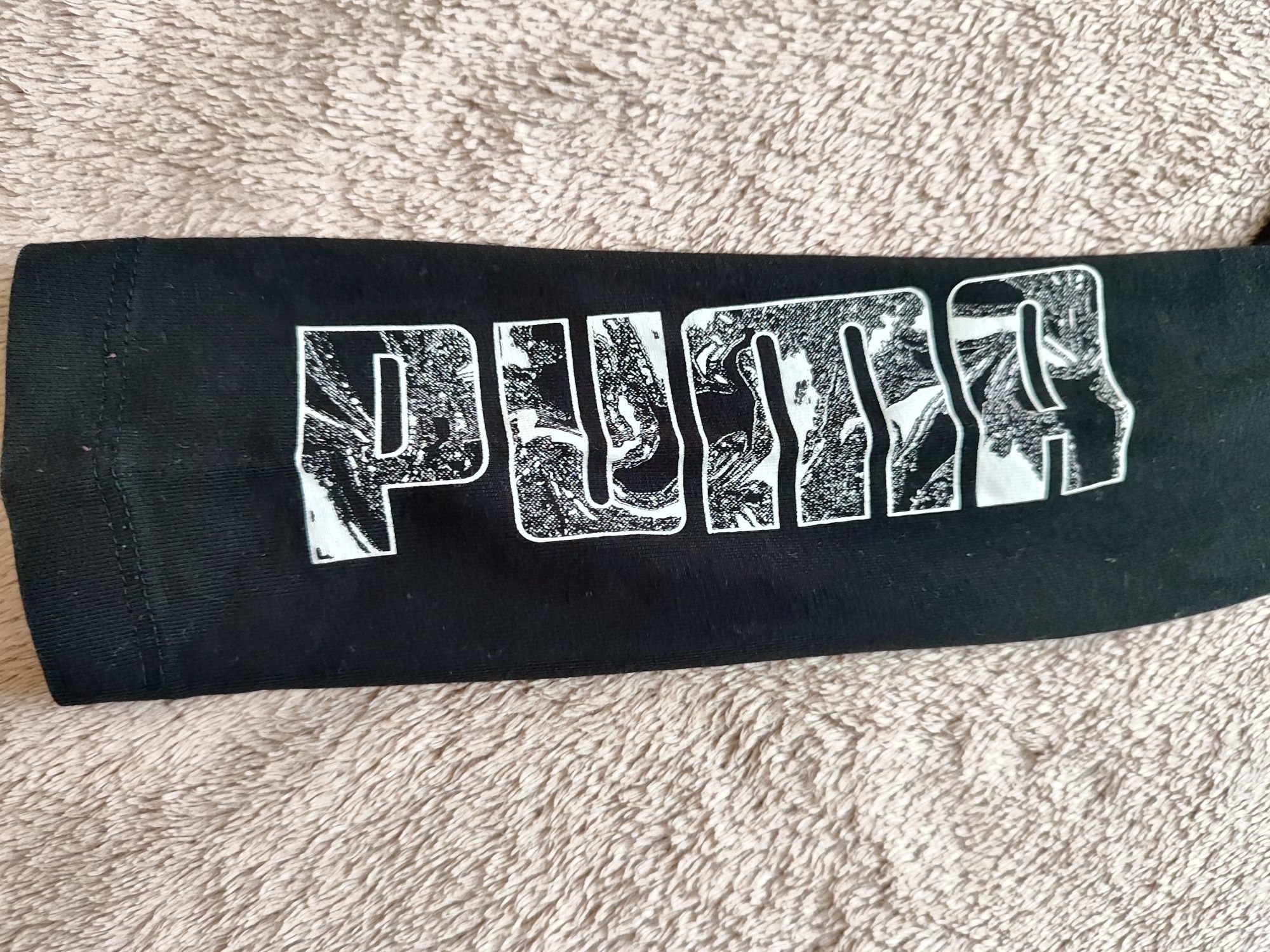 Czarne legginsy Puma rozmiar 140 (9-10 lat)