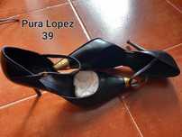 Sapatos, botas e sandálias usadas, de marca