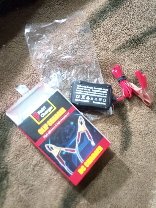 CLIP CHARGER Зарядное для моб телефонов