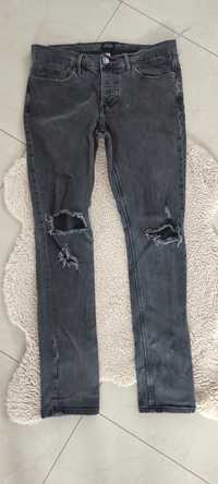 Spodnie jeansowe z dziurami River Island 30/32
