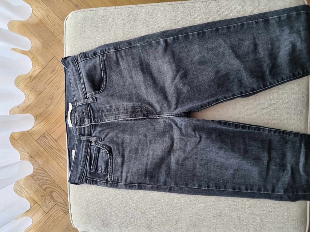 Czarne spodnie dżinsy jeansy skinny Levi's W29