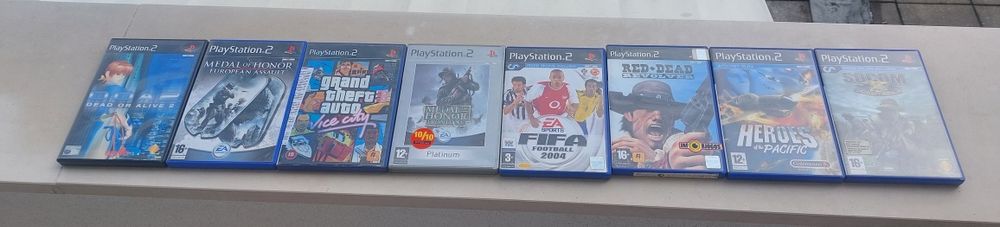 PS2 with Additional Games in Original Condition64729401033090123