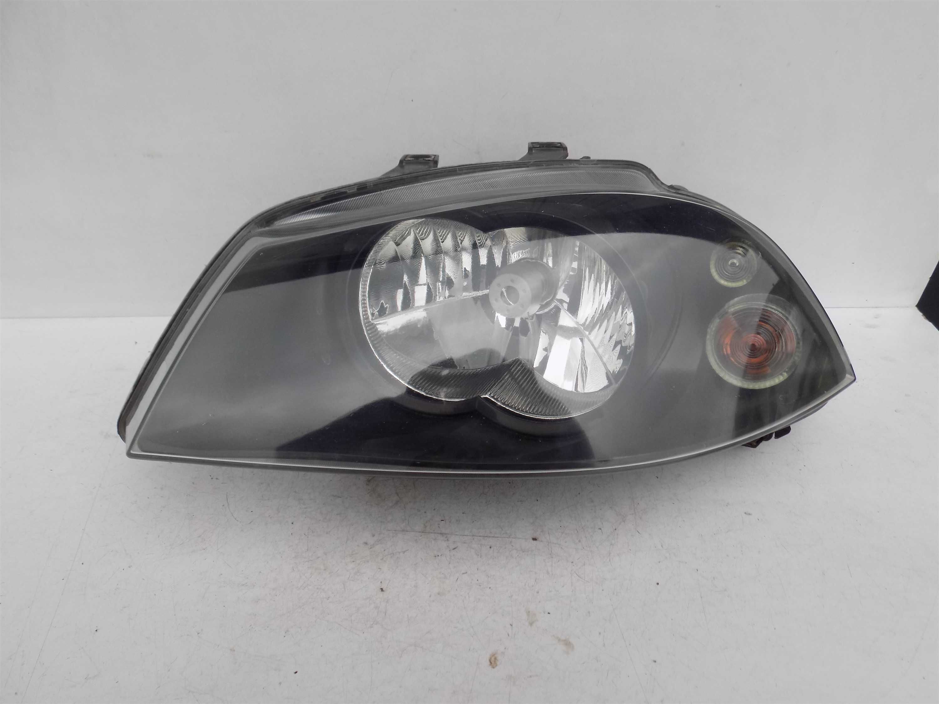 Lampa przód lewa Seat Ibiza Cordoba 6l 02-08 H4 oryginał Europa