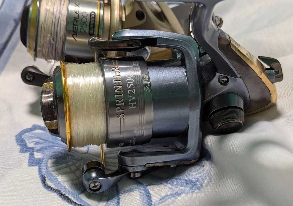 Рыболовные катушки Shimano-Daiwa размер 2500 с леской