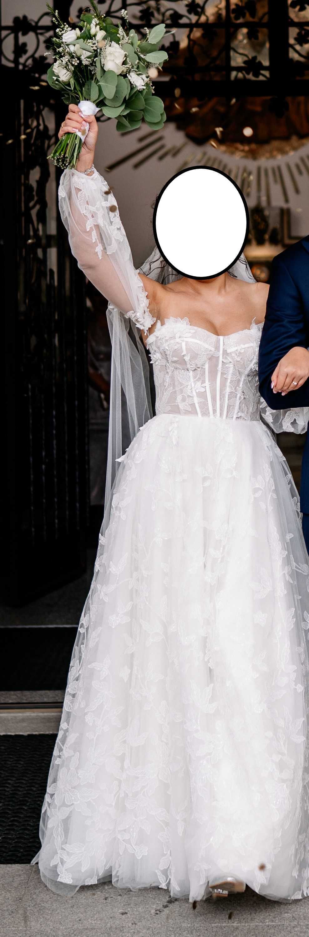 Piękna suknia ślubna z dopinanymi rękawkami