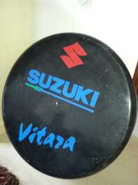 Tampa/protecção fibra da roda suplente Suzuki Vitara
