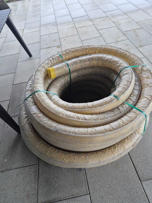 Rura drenarska w otulinie FI 100 około 42M