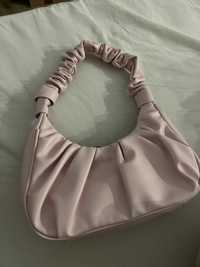 mala / bolsa rosa ….