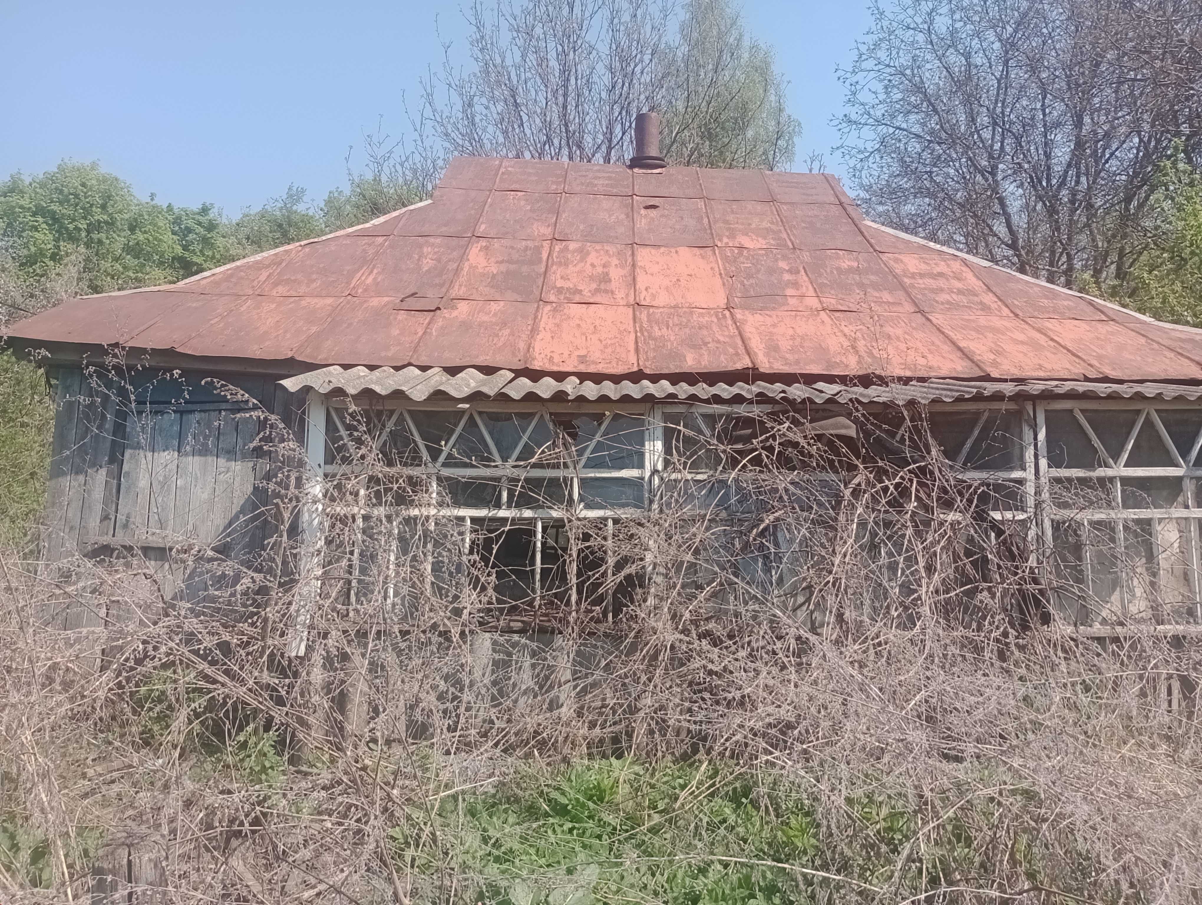 Земельна ділянка з будинком