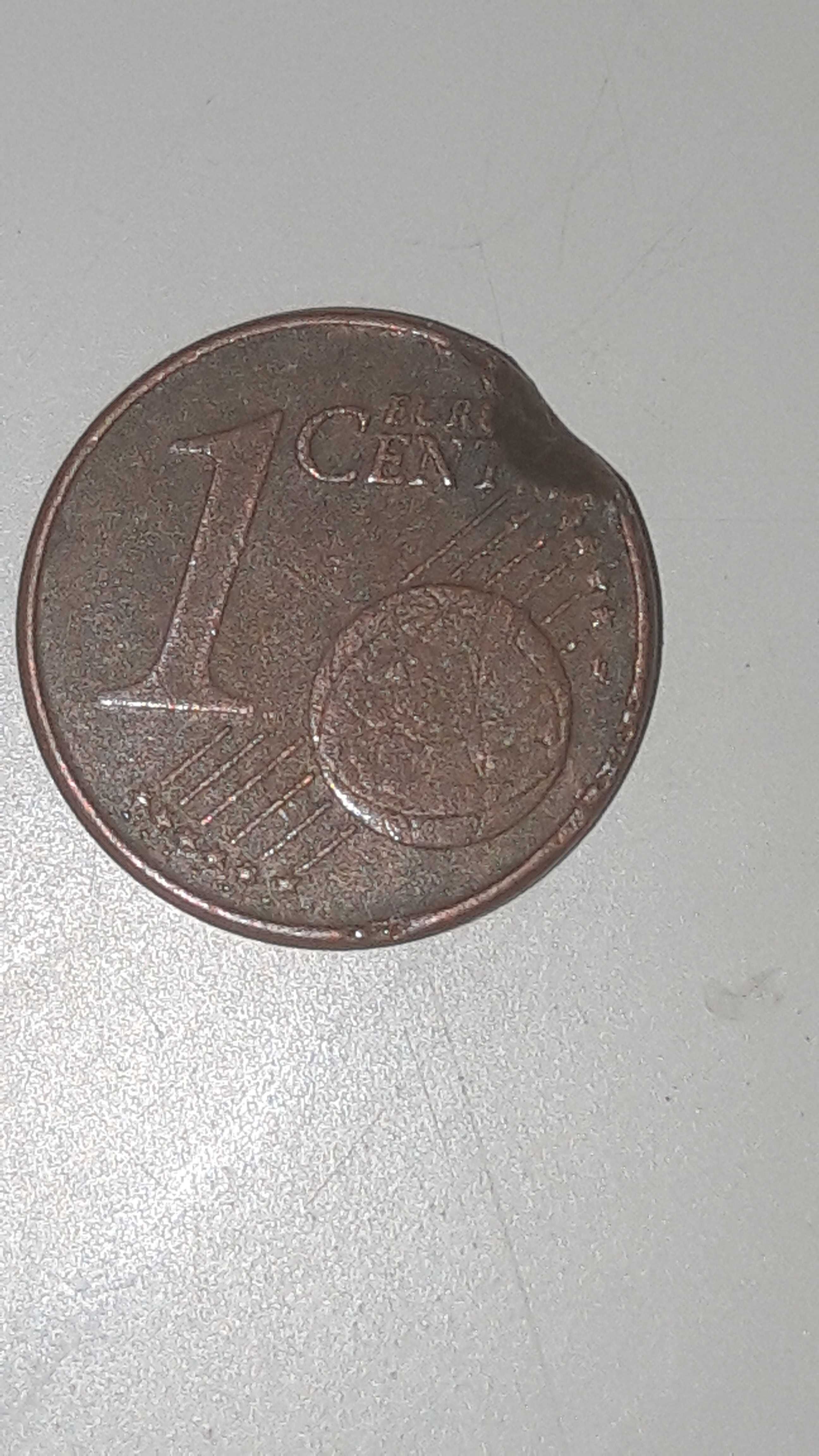 3 moedas de 1 centimo com defeito.