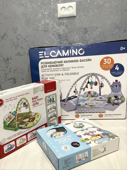 Розвиваючі килимки для діток