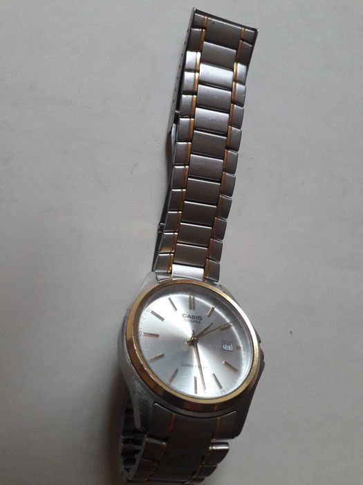 Мужские часы CASIO quartz  MTP-1183 (титановый корпус)