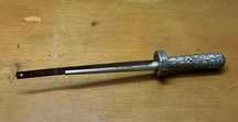 Lima de Metal com Cabo de Borracha