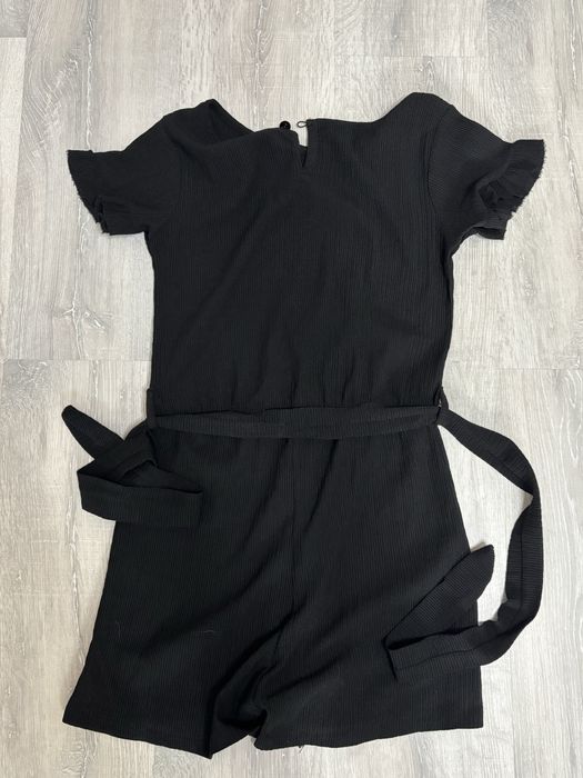 жіночий комбінезон з поясом