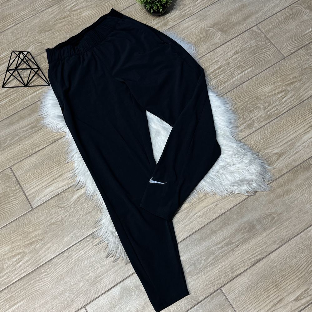 Легкі жіночі нейлонові спортивні штани nike xs оригінал