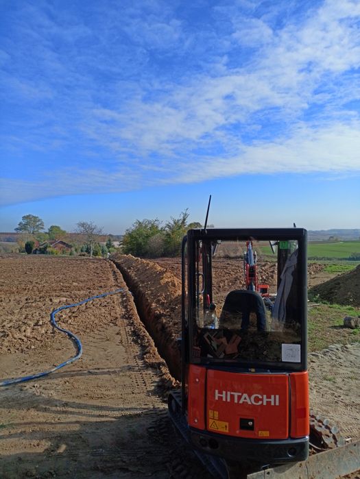 Usługi koparko ładowarką Kazimierza. Niwelacja. Koparka gąsienicowa