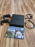 PlayStation 4 Slim 500GB + 2 comandos + 2 jogos