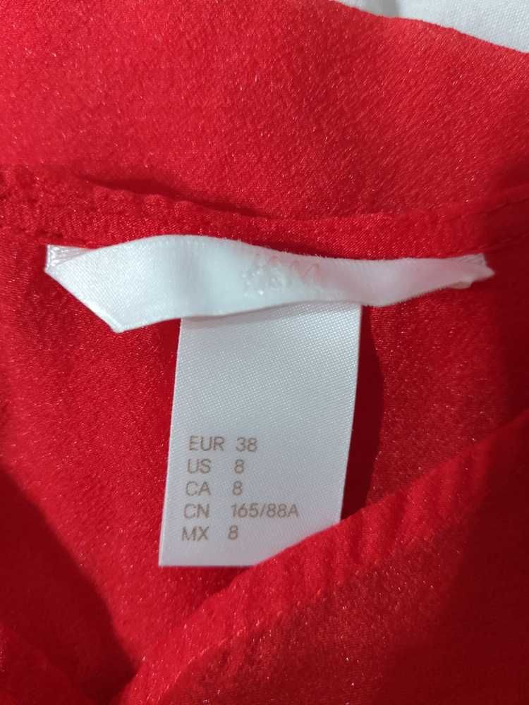 Blusa vermelha transparente