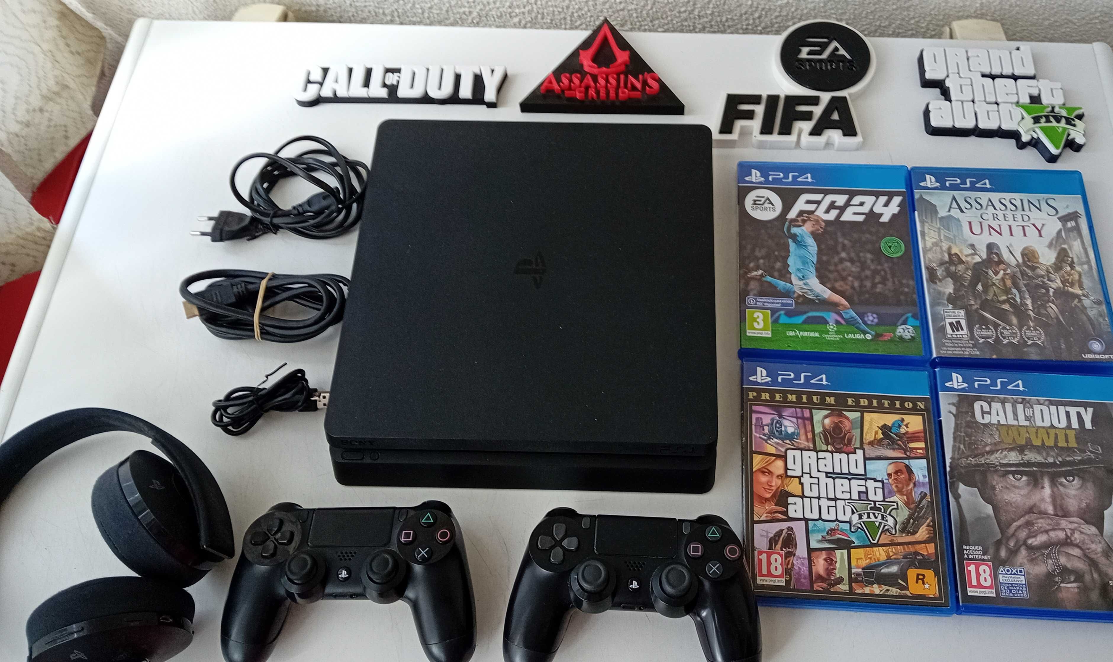 Consola ps4 slim 1Tb + 2 comandos oficiais + FC 24 + GTA V