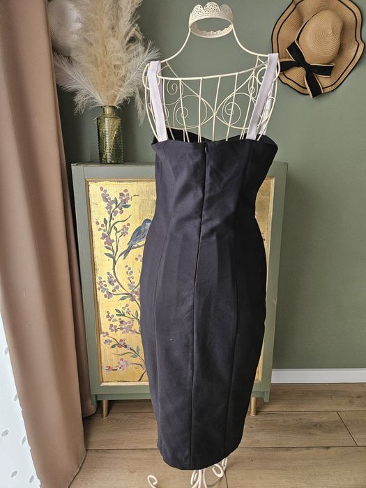 Elegancka sukienka damska midi  Mohito z kokardą i wycięciem wesele