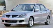 Накладки на бампера на пороги Mitsubishi Lancer 9. Обвес  Ланцер 9