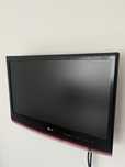 Televisão LG com suporte de parede