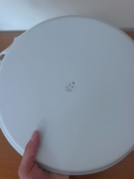 Prato rosa com flores da porcelares