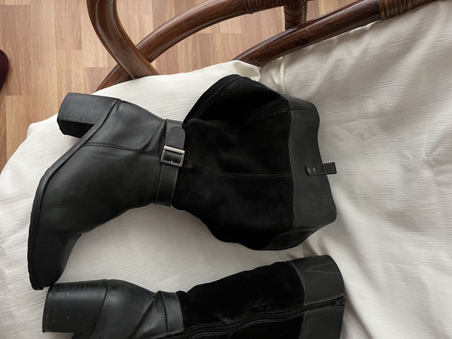 Botas pretas de cano alto