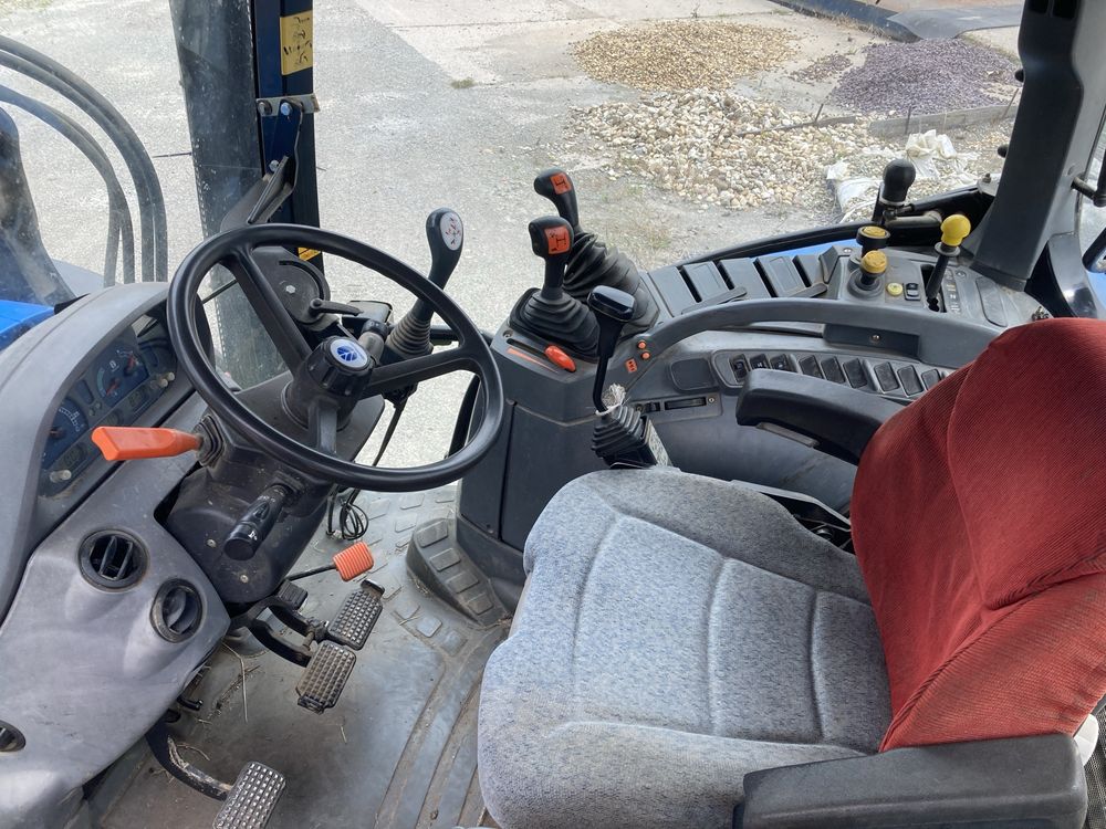 New Holland TS100A z Turem