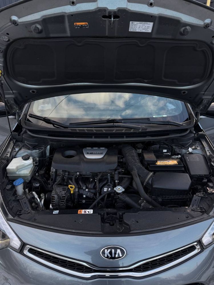 KIA Cerato Koup 1.6 T-GDi ( 204 л.с. ) 2014 год