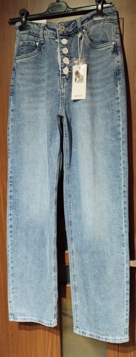 Dżinsy damskie wysoki stan szwedy guziki M.Sara
