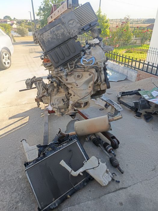 Motor e caixa Mazda 2