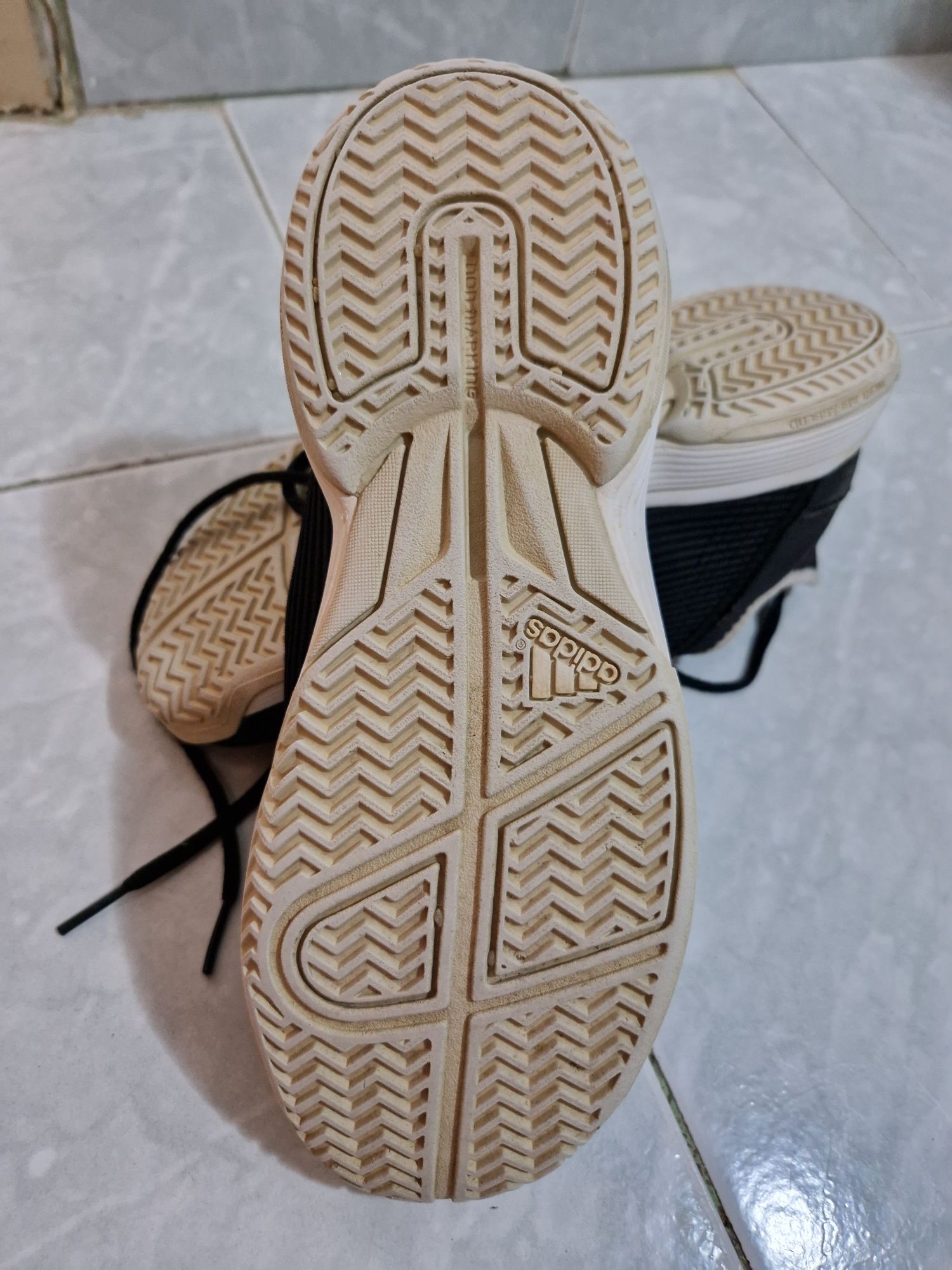 Black Adidas sneakers