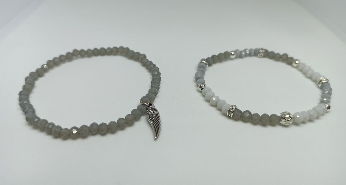 Dwie kryształkowe szare bransoletki ze srebrnymi elementami