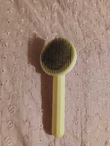 Escova auto-limpeza para animais de estimação