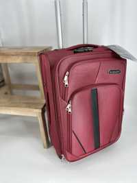 Nowa walizka kabinowa materiał