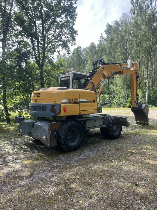 LIEBHERR A312 lift podpory koparka kołowa 314