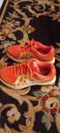 Tenis Nike laranjas