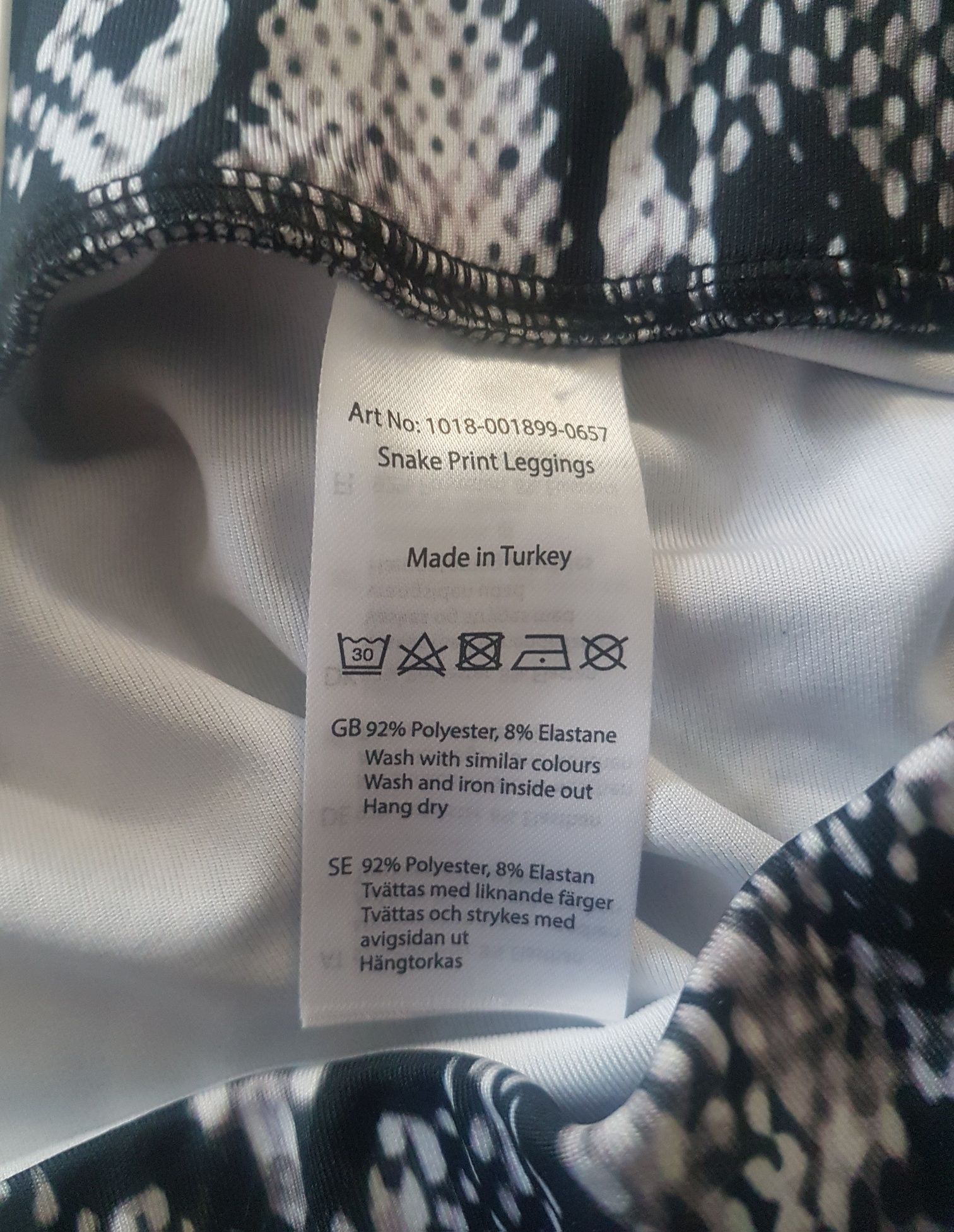 NA-KD nowe getry legginsy na gumce wysoki stan skóra węża L XL 40 42