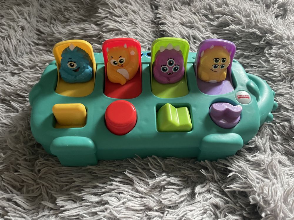 Fisher Price stworek z niespodziankami