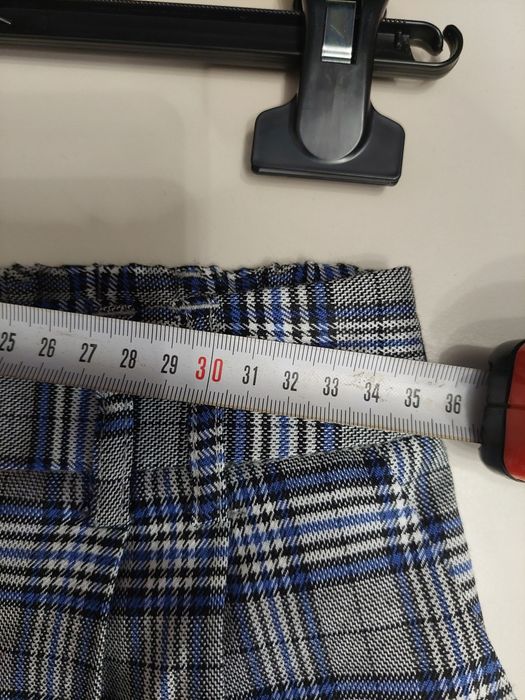 Nowe spodnie damskie w kratę Sinsay M chinosy