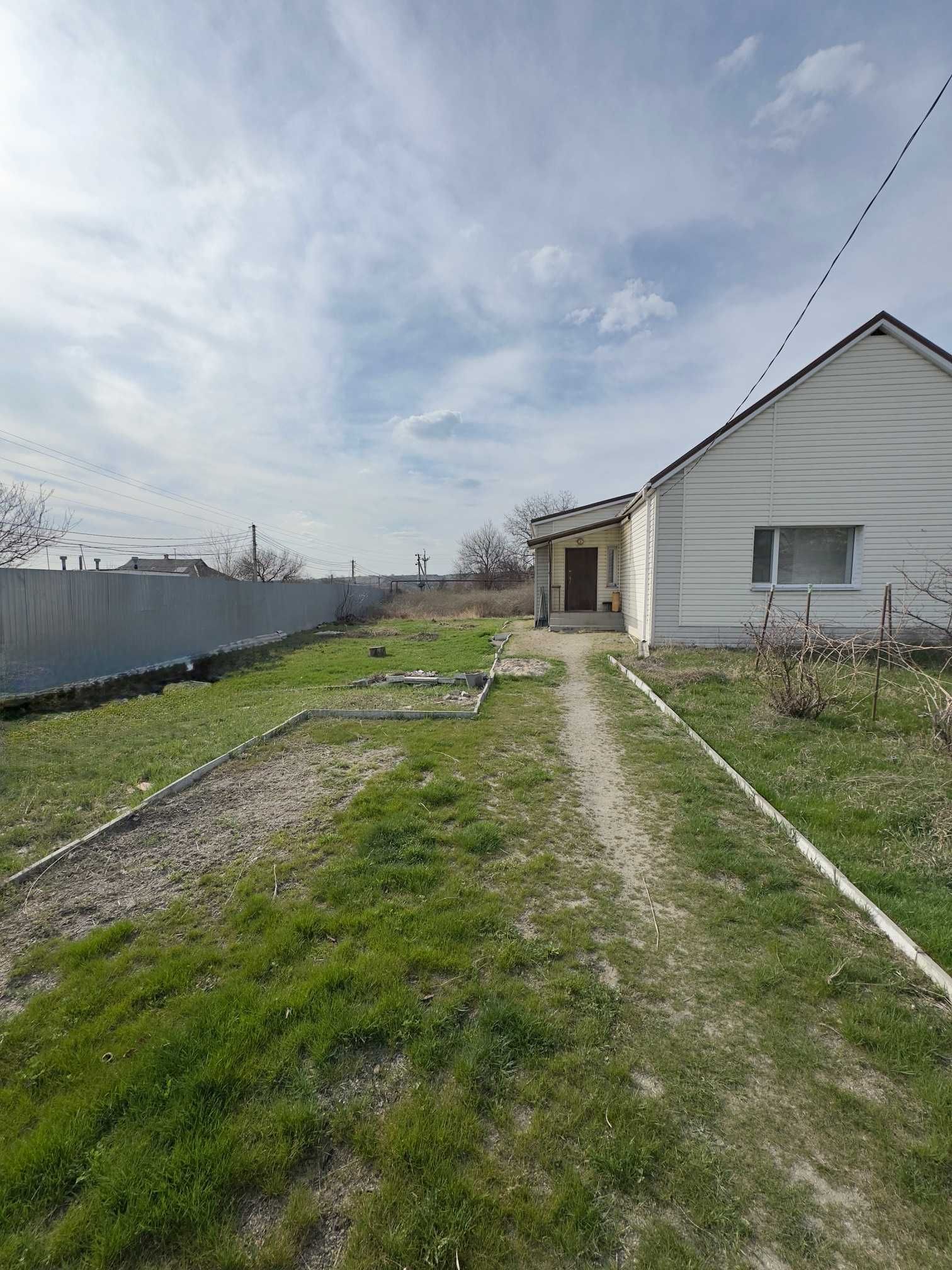 Продам дом в Подгородном (вул. Партизанская ), 69 М2, участок 13 сот!