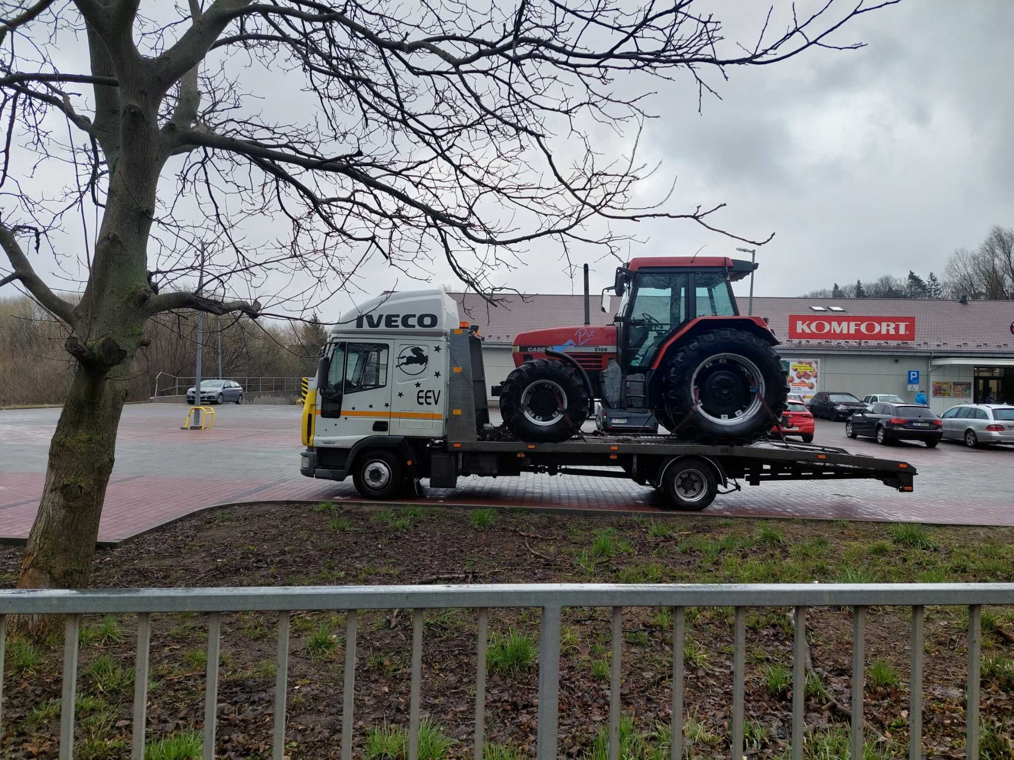 Transport maszyn  laweta pomoc drogowa